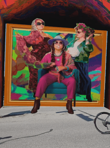 Three costumed figures appearing in augmented reality over the 3 Fates mural in Vancouver