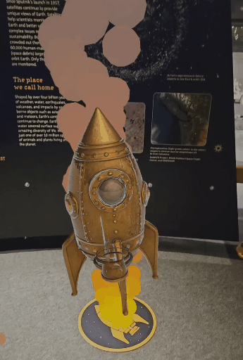 Animated retro rocket launching from a Cosmic AR floor marker
